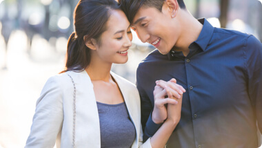 Happy and successful Asian couple in love 